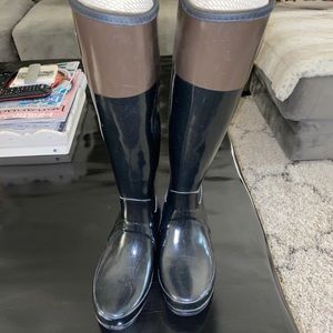 One pair of Hunter rain boots, gently pre loved